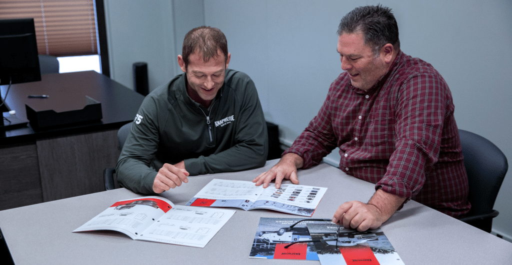 Knapheide representative talking with customer about upfit options.