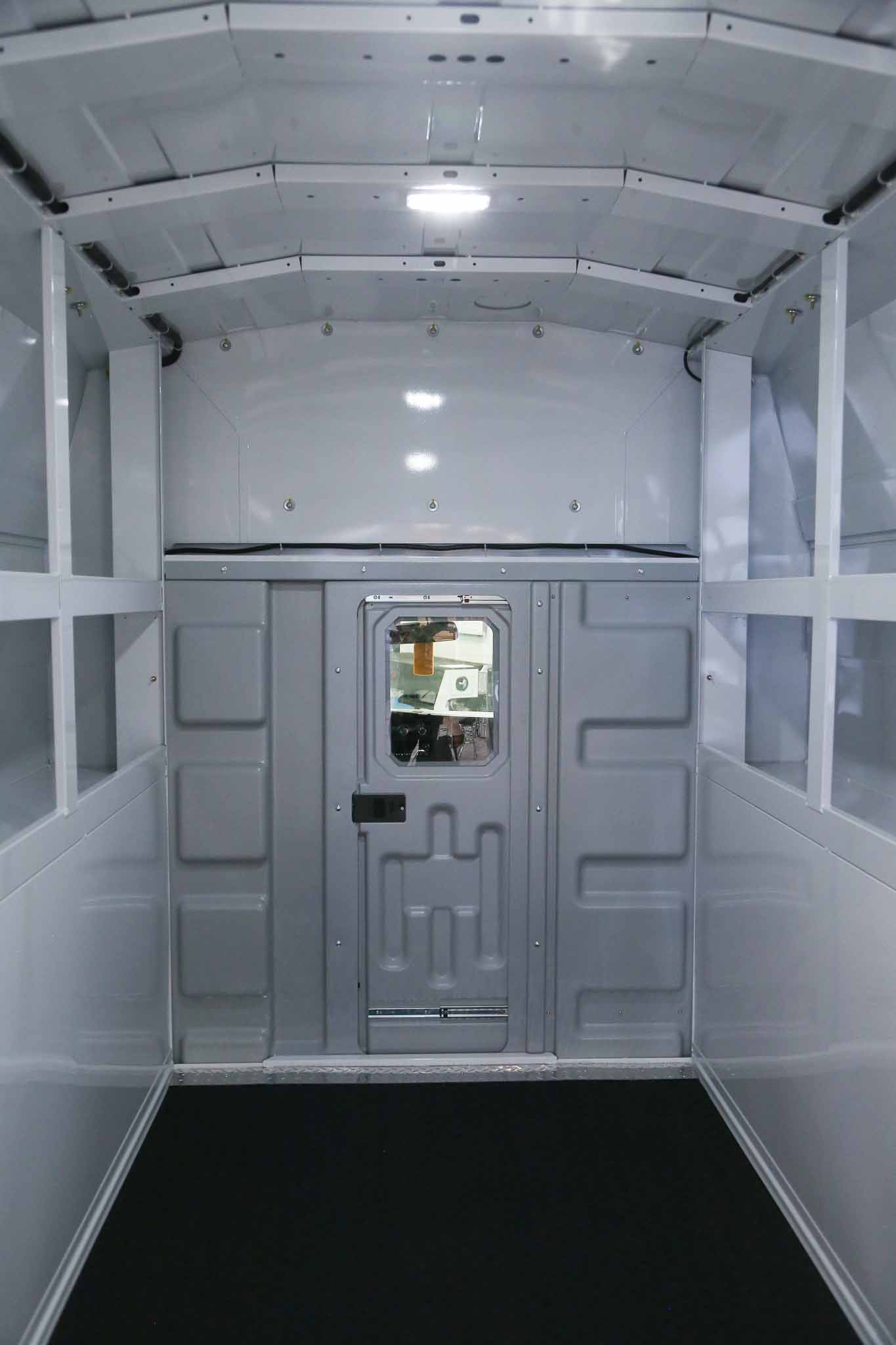 ABS cab partition with sliding door
