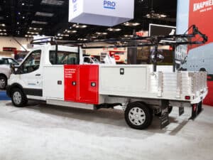 Knapheide Aluminum Combo Body On Ford E Transit NTEA Work Truck Show 2025 Street Side Corner
