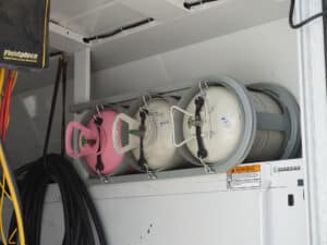 Mommens Heating And Cooling Refrigerant Tank Retainer In Kuv Van Cargo Area