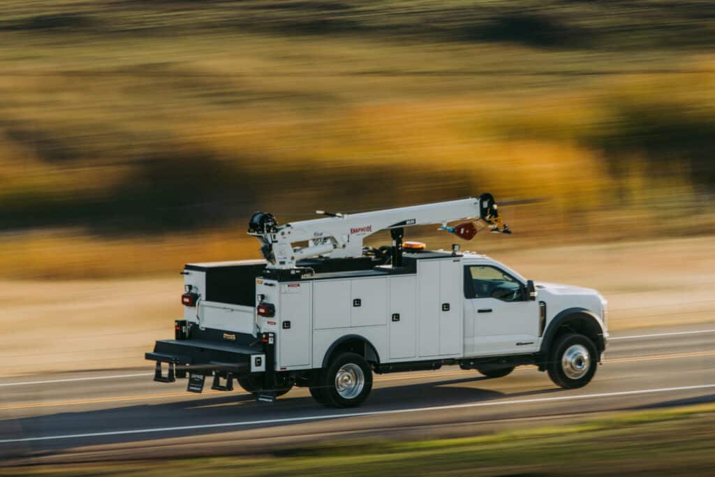 Knapheide Mechanics Truck Driving On Roadway