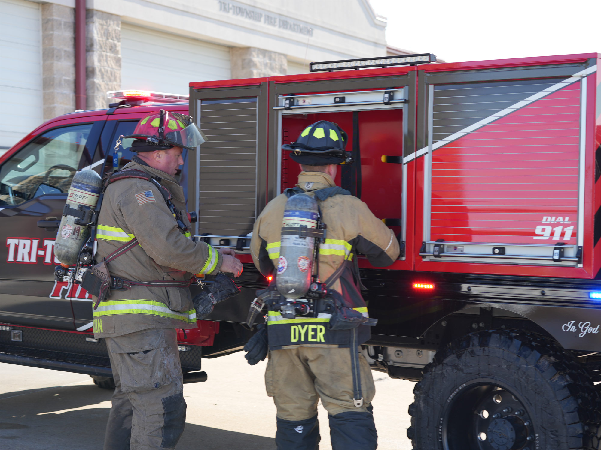 Tri-Township-Fire-Department-Firefighters-Grabbing-Gear-From-Knaphdeide-Brush-Truck-Compartment