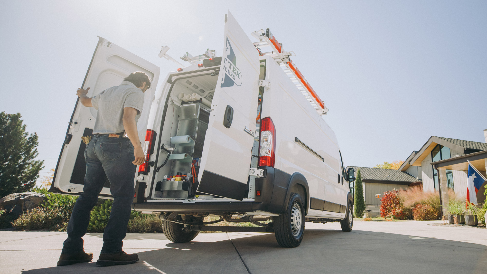 Service-Professional-Opening-Rear-Doors-of-Cargo-Van-Upfit-with-Knapheide-Van-Equipment