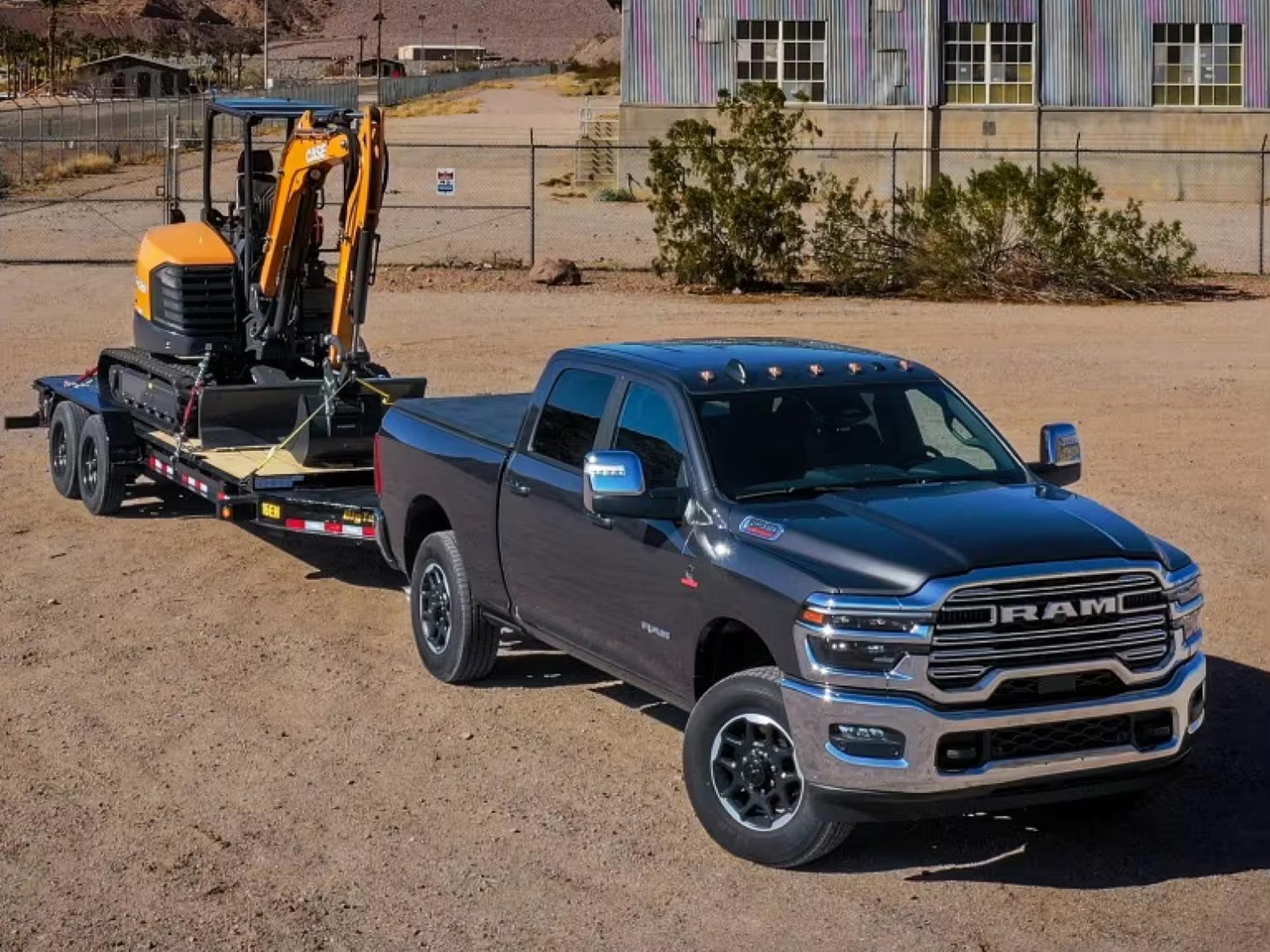 Ram Truck With Bed Cover And Hitch And Trailer Hauling Equipment