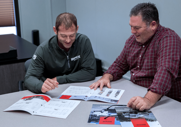 Knapheide representative talking with customer about upfit options.